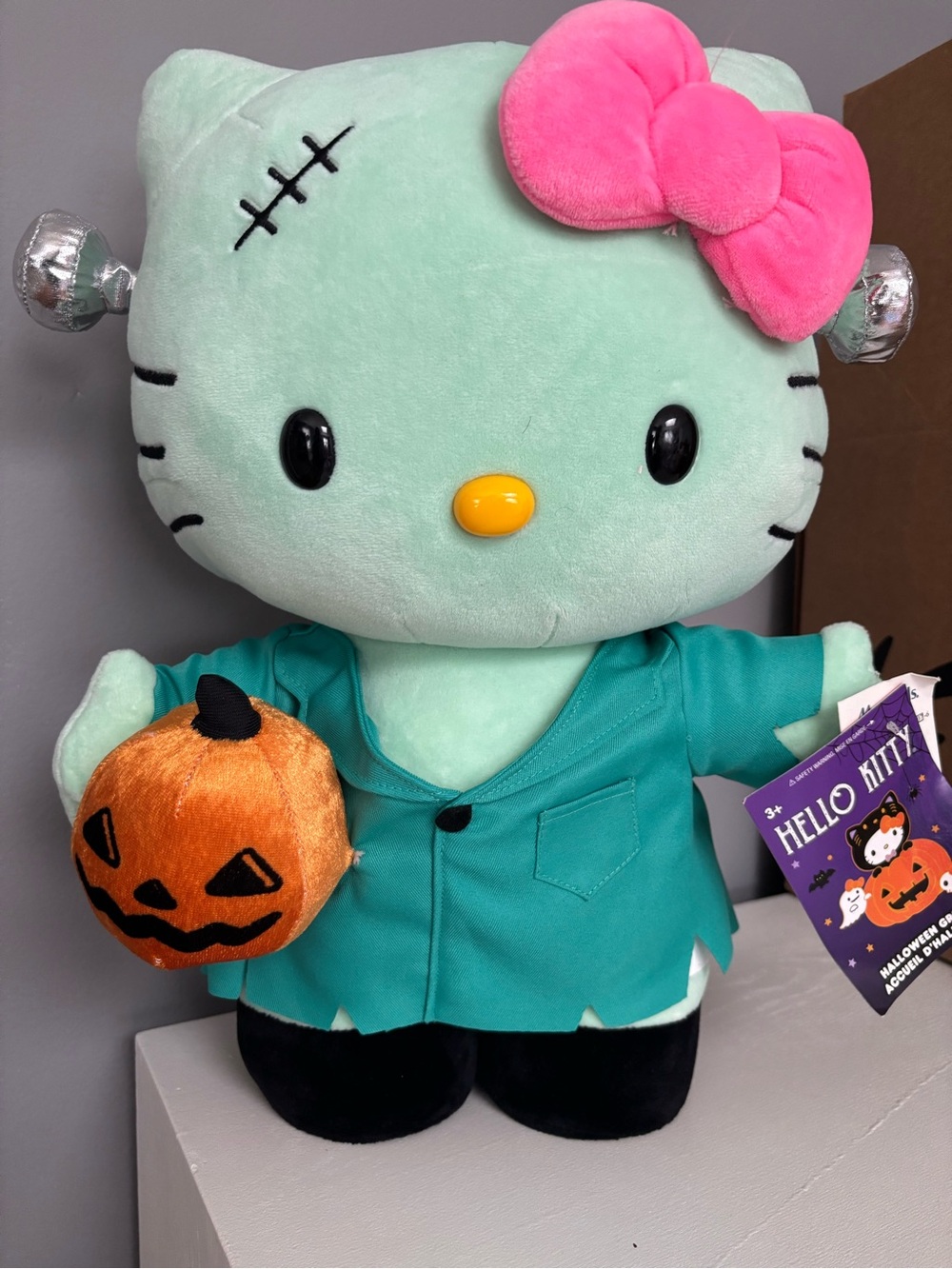 Hello Kitty Mint Green Frankenstein Plush with Pink Bow and Orange Pumpkin - Picture 2 of 3